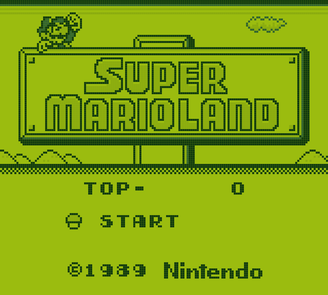 Écran titre de Super Mario Land dans gbe, aux couleurs de la palette DMG verte, avec la grille du filtre LCD